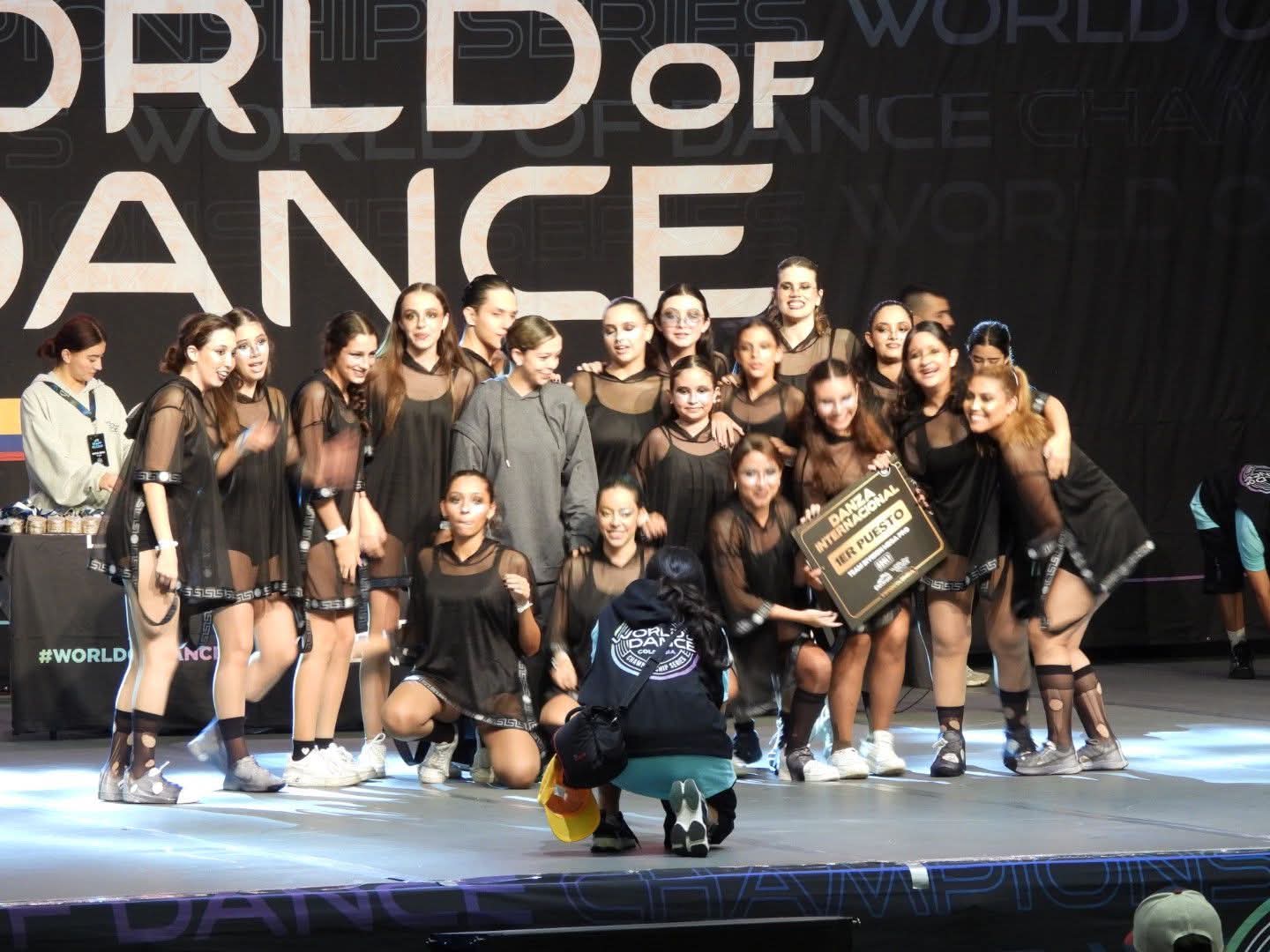 Academy dancers on stage at World of Dance — 1st place international danza
