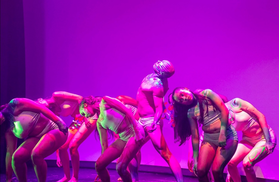 Group of dancers in synchronized choreography